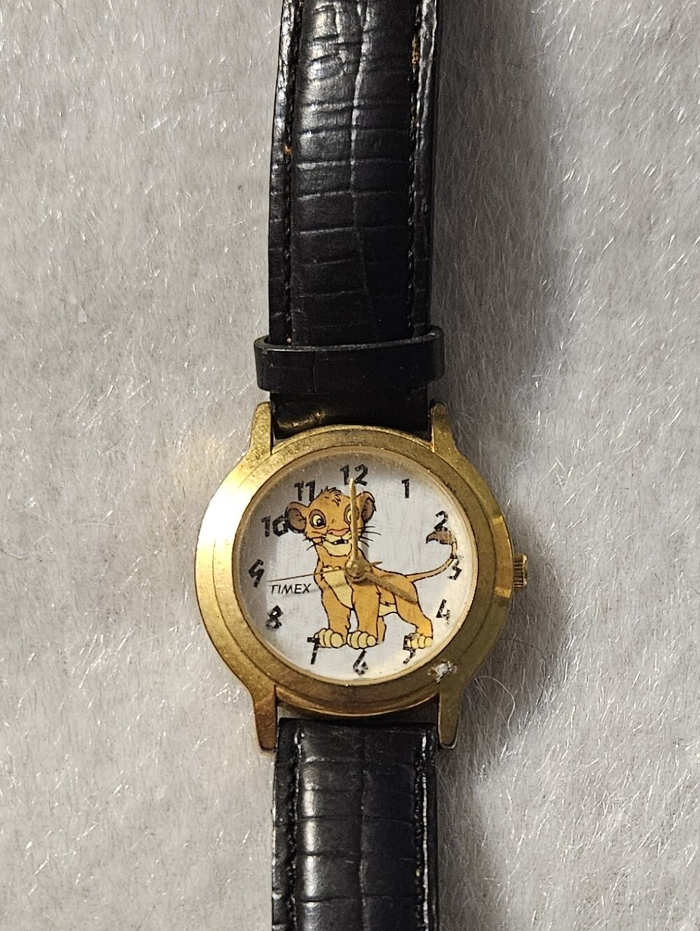 Lion King Timex Gold-Tone Case Watch with Black Leather Strap